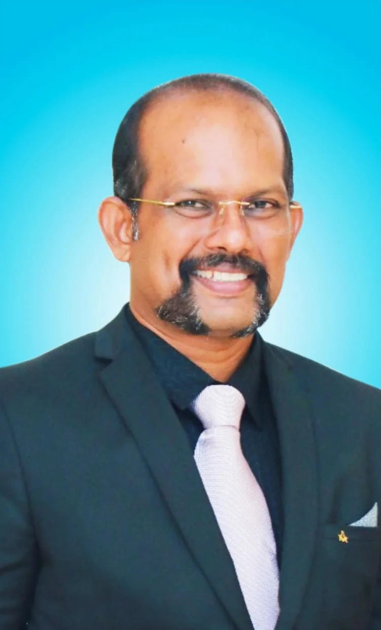 Portrait of Dr. T. S. Chellakumarasamy, rehabilitation specialist in Erode